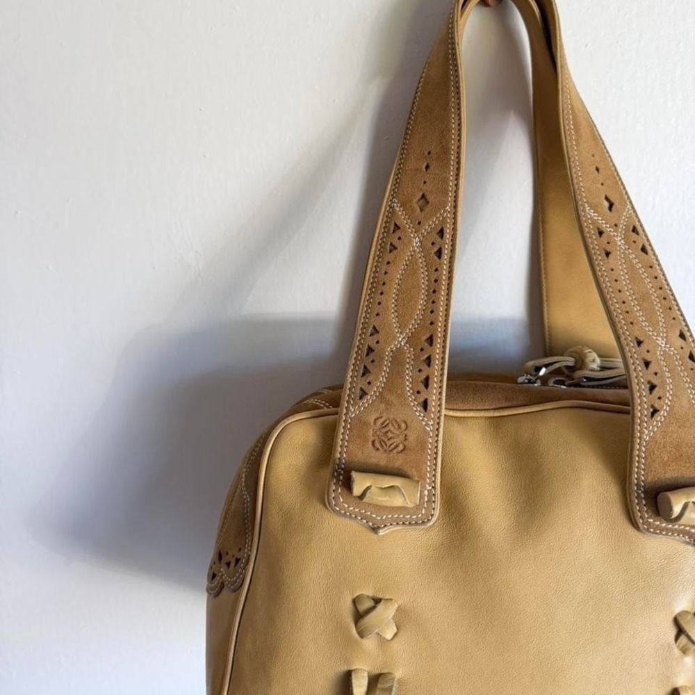 Loewe tan western leather handbag with suede straps and lace-up detail